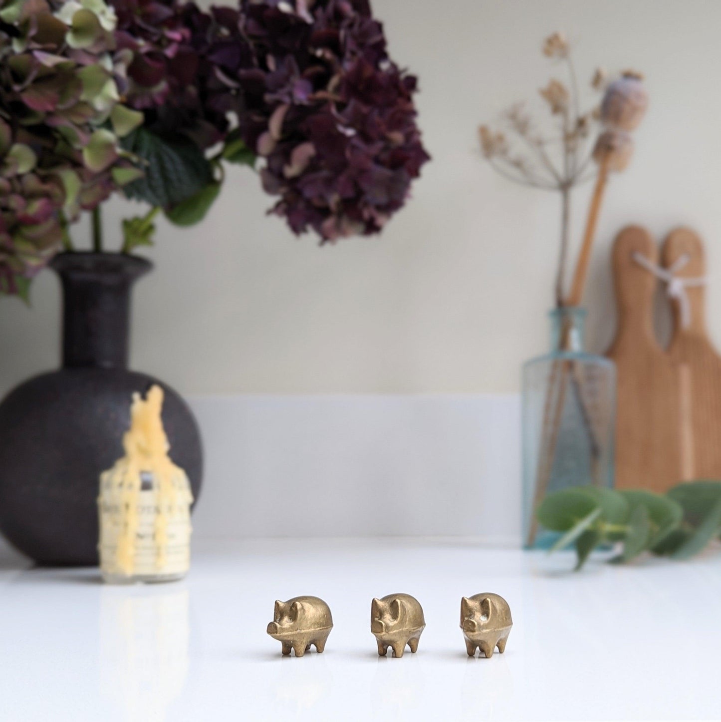 Three Little Brass Pigs