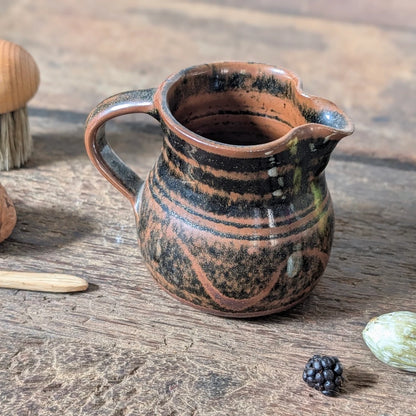 Winchcombe Pottery Black and Terracotta Slipware Jug