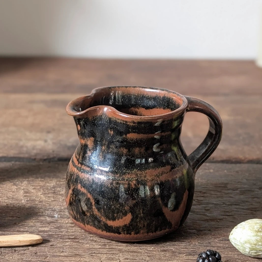 Winchcombe Pottery Black and Terracotta Slipware Jug