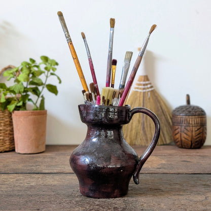 Dark Glossy Glazed Stoneware Jug with Paintbrushes