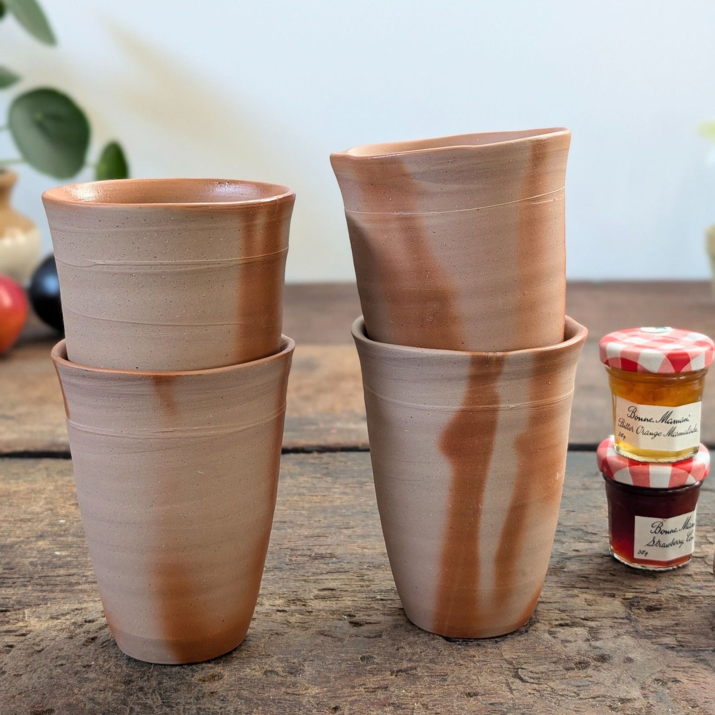 Four Ceramic Beaker Tumblers