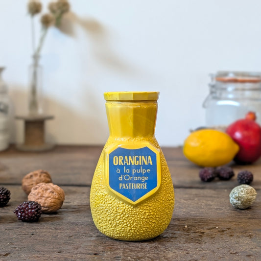 Yellow Orangina Advertising Straw Holder
