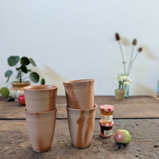 Four Ceramic Beaker Tumblers