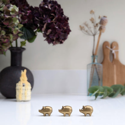 Three Little Brass Pigs